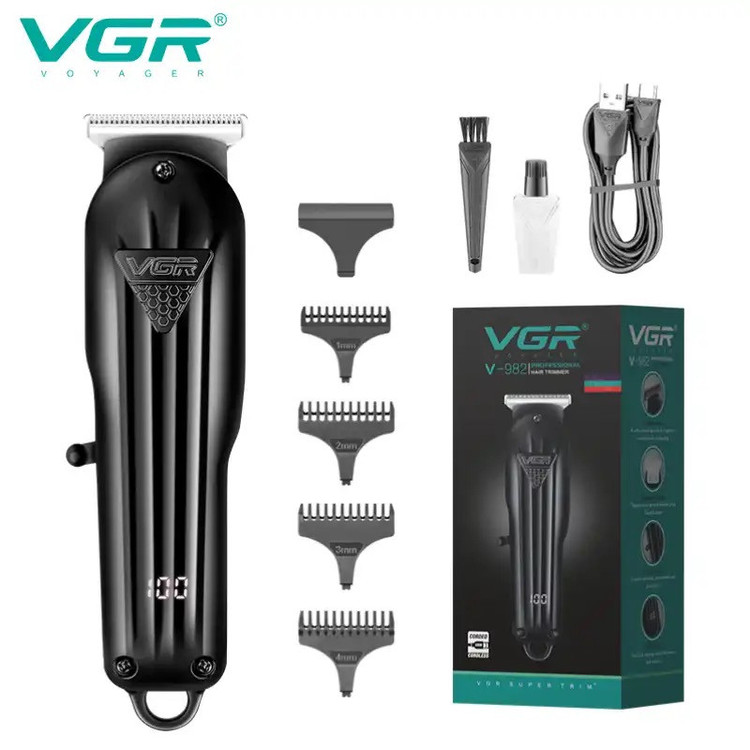 ماشین اصلاح موی سر و صورت وی جی ار مدل V-982 با تیغه استیل پیشرفته، منبع انرژی باتری، مدت زمان استفاده 120 دقیقه، مدت زمان شارژ 120 دقیقه، همراه با کابل شارژ USB، شانه و دفترچه راهنما